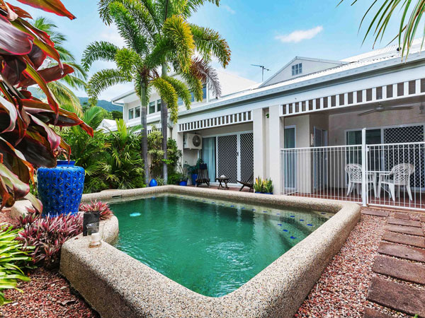 a plunge pool in front of The Villas Palm Cove accommodation