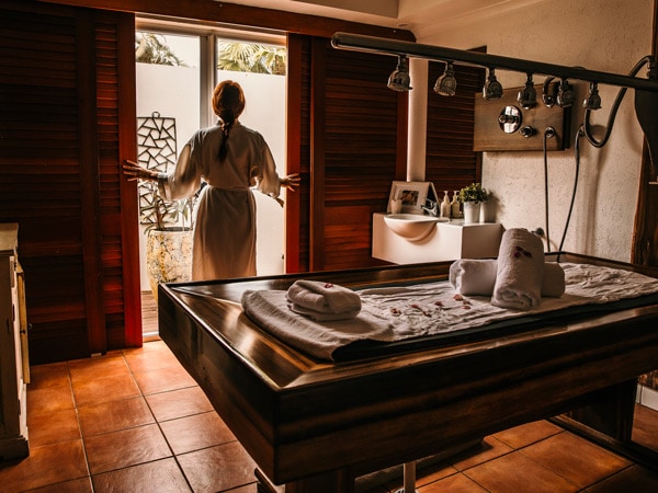 a woman standing in her robe at Reef House, Palm Cove