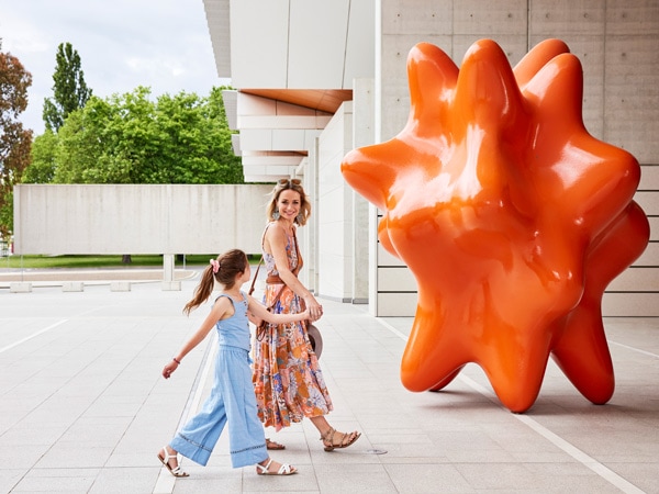 a mother and daughter exploring the National Portrait Gallery, Canberra