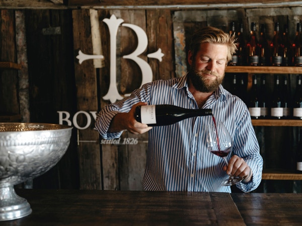 a man pouring wine into the glass at Boydell’s Cellar Door & Restaurant 