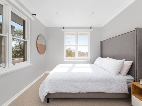 a bedroom with window at Bunda House