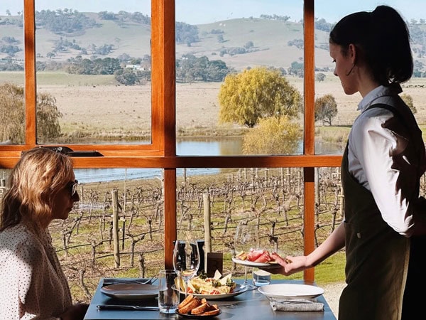 a woman dining at Cleveland Estate