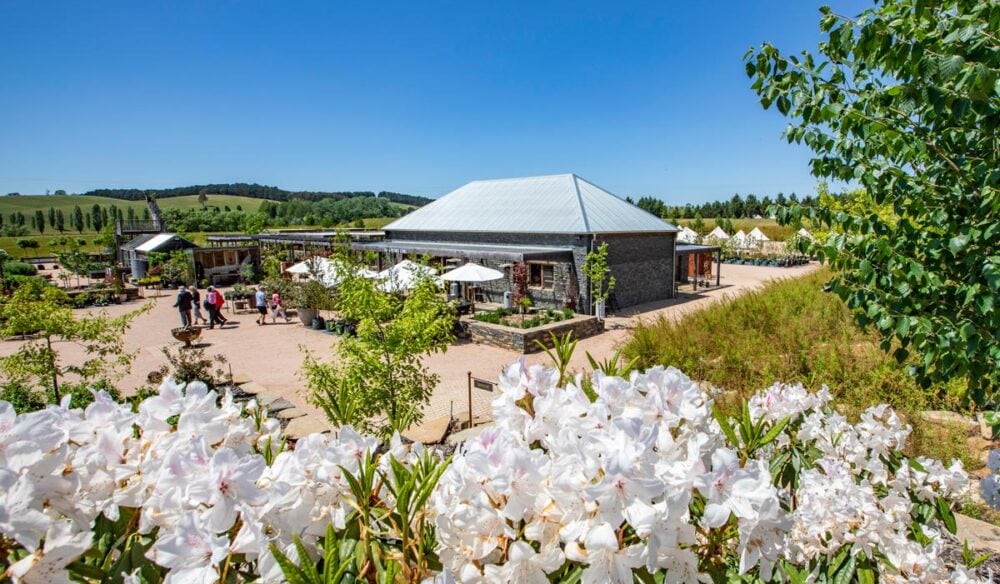 visitors enjoying the scenic grounds of Mayfield Gardens, Oberon