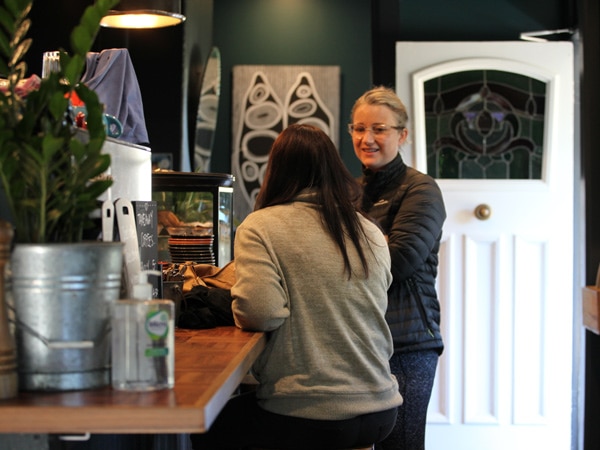 two people talking at the counter of Myrtle & Stone, Hunter Valley