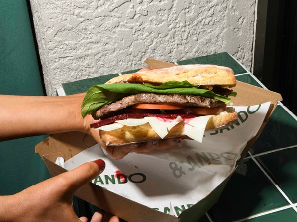 a close-up of a sandwich at &Sando, Canberra
