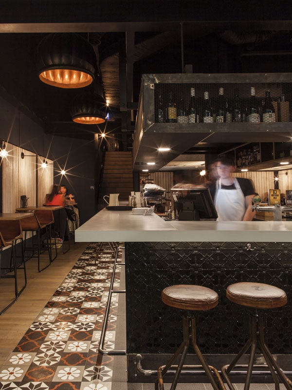 a dimly lit fine dining interior at Temporada, Canberra