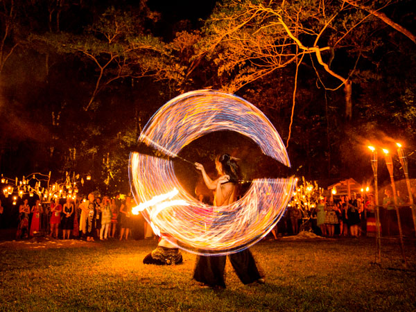 a fire dancer at Flames Of The Forest, Cairns restaurants