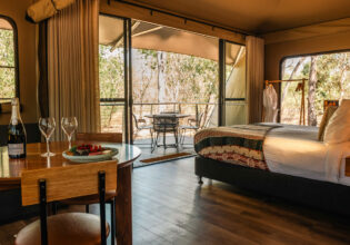 a luxury accommodation with balcony at Cooinda Lodge, Kakadu