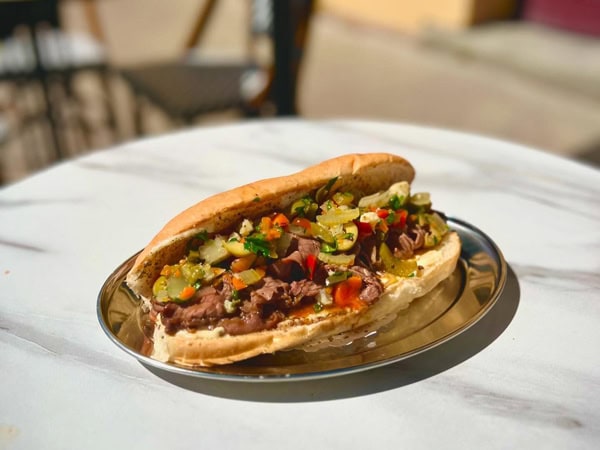 a panino on a plate at Arno Deli, Newcastle