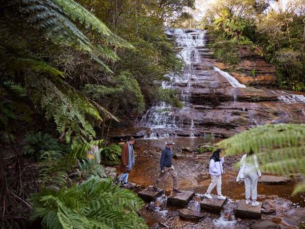 bushwalking past a waterfall in Katoomba
