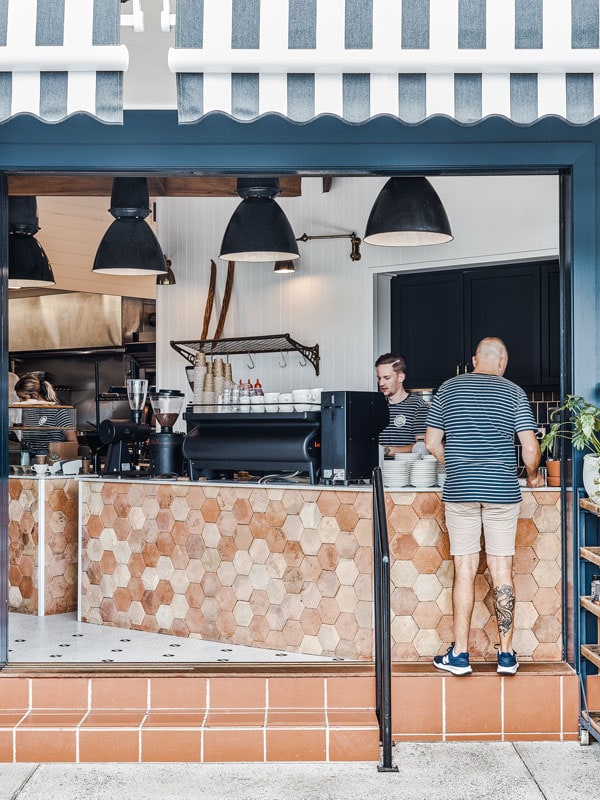 a man ordering coffee at Cubby Bakehouse