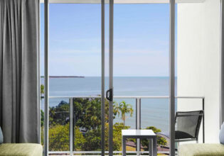 a balcony with sea view at Mantra Trilogy Cairns