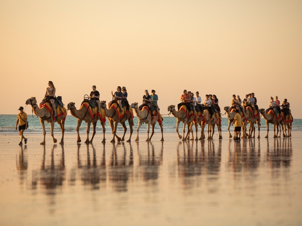 riding camels on Cable Beach, Broome at sunset