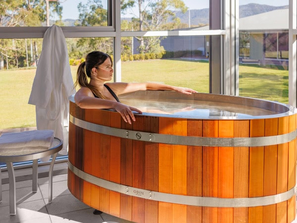 a woman soaking in a tub at Elysia Spa