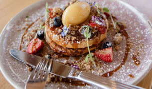 fluffy buttermilk pancakes on a plate at Goodfriends Eatery, Newcastle