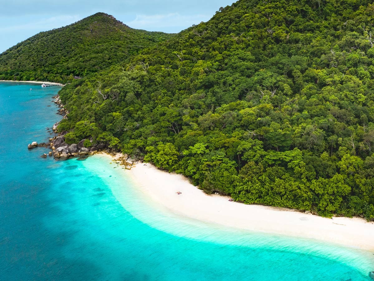 an aerial view of the turquoise waters of Nudey Beach