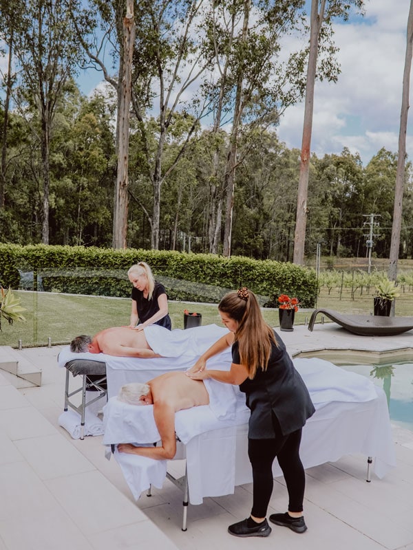 a massage by the pool at Nu Leaf Retreat