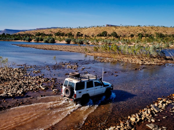 an aerial view of 4WD travelling through the Pentecost River Crossing