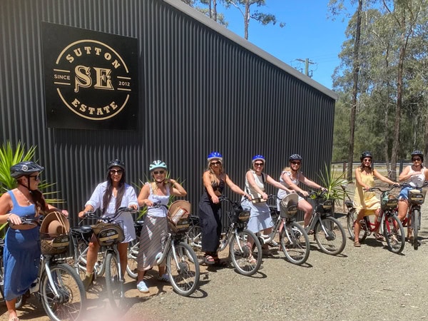 a group of people riding electric bikes from Sutton Estate Electric Bike Hire