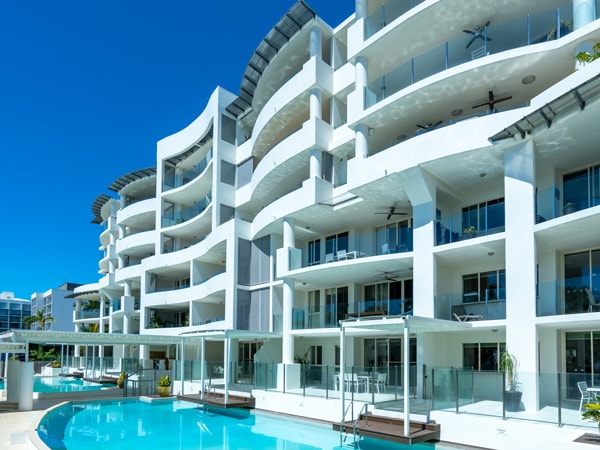 an outdoor pool at Waters Edge Cairns Luxury Apartments