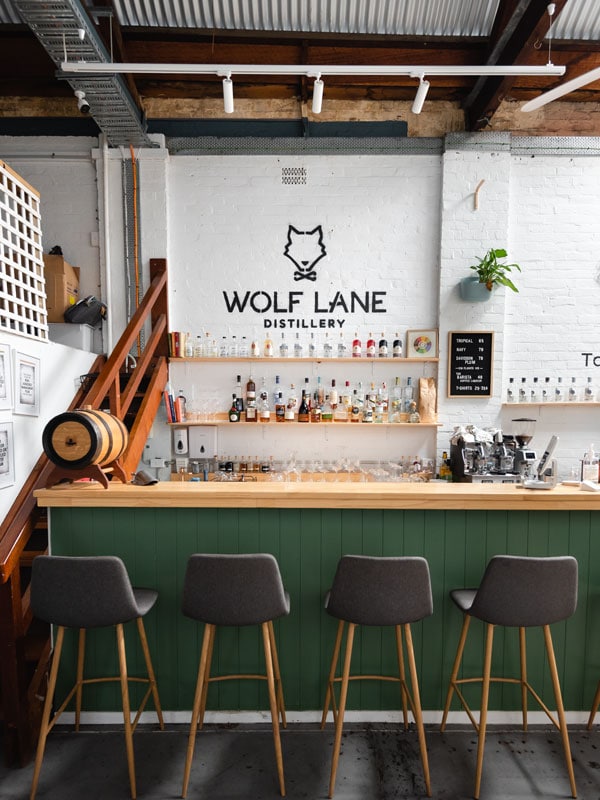 empty chairs at Wolf Lane Distillery, Cairns