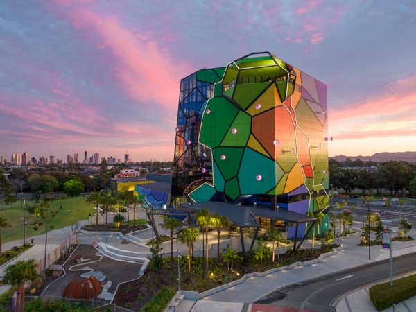the colourful building of HOTA at sunset