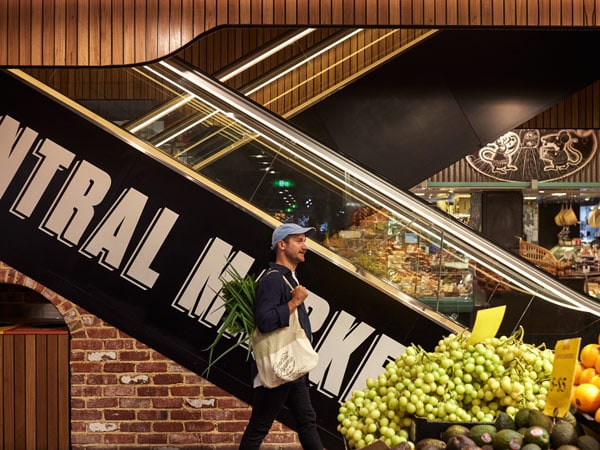 a man shopping at Adelaide Central Market