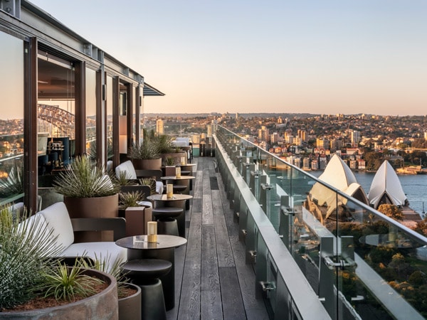 views of Sydney on top of the rooftop bar at Aster, Sydney, NSW