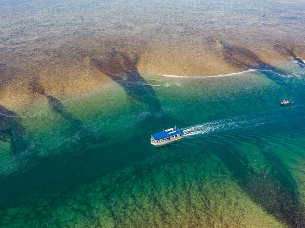 an aerial view of Coral Expeditions during The Kimberley Cruise on Montgomery Reef
