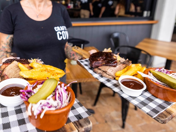 Platters of food at The Crafty Cow Smokehouse, Casuarina