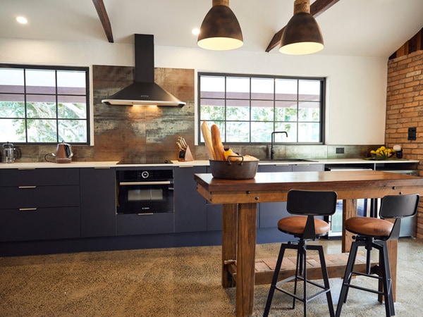 the dining and kitchen interior at DumDum Cabin, Mt Warning Estate, Murwillumbah accommodation