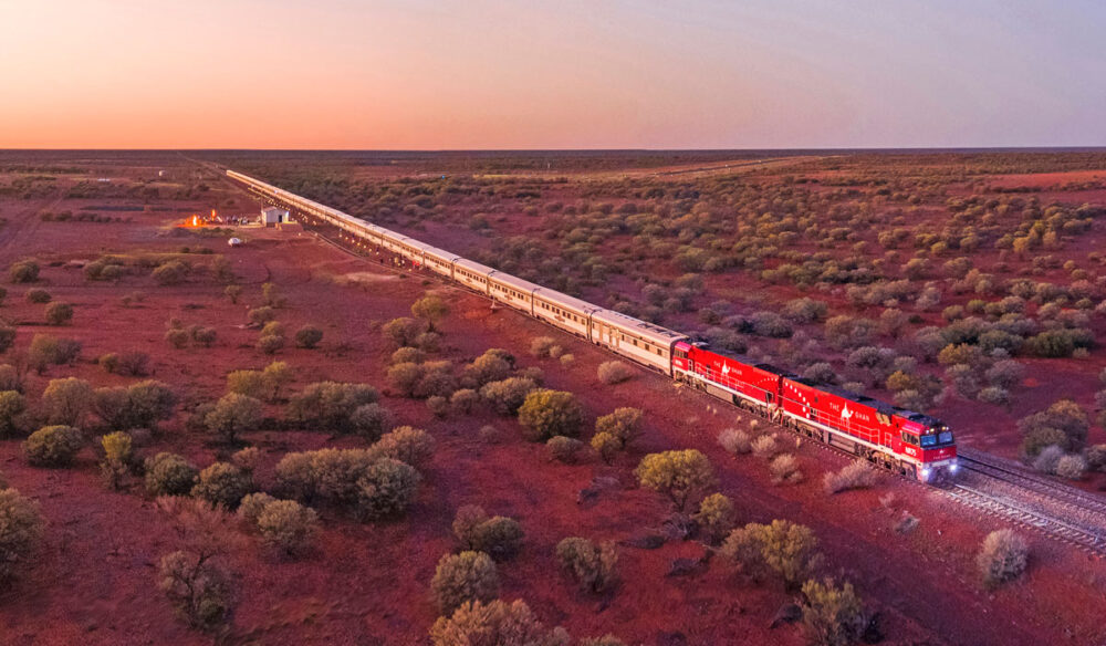 the legendary Ghan venturing across the bold-red landscape in the Northern Territory