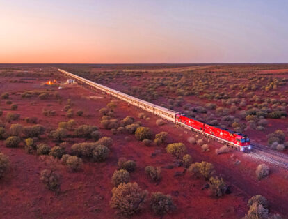 the legendary Ghan venturing across the bold-red landscape in the Northern Territory
