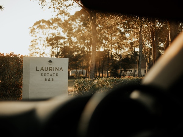 the sign of Laurina Estate at the entrance
