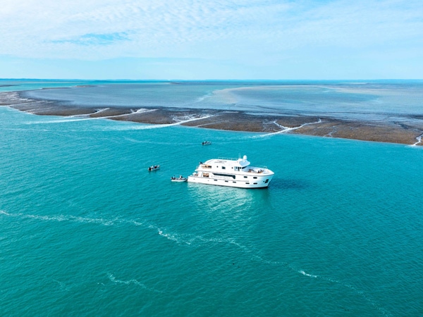 an aerial view of Kimberley Quest sailing across Montgomery Reef