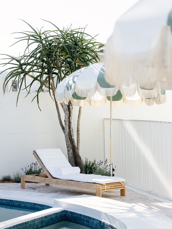 a sunbed by the poolside at Motel Molly in Mollymook