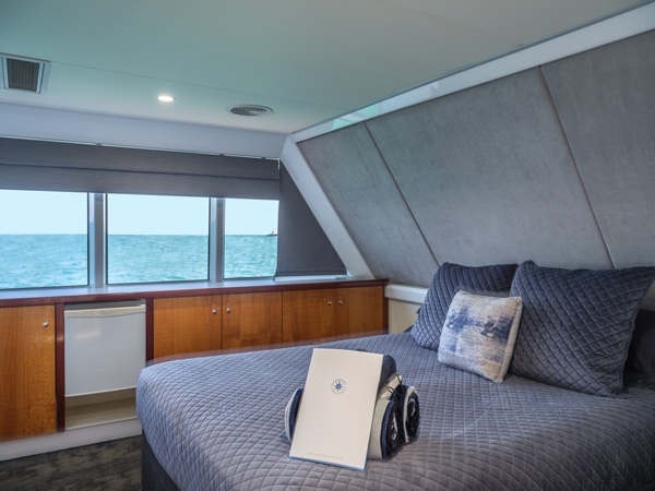 a cosy cabin inside The Great Escape Charter Company ship