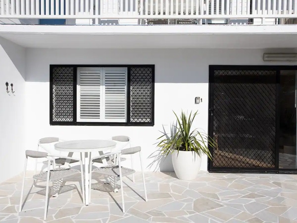 an outdoor seating area at Potts-Villas