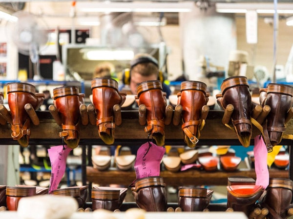 A worker making boots at R.M. Williams