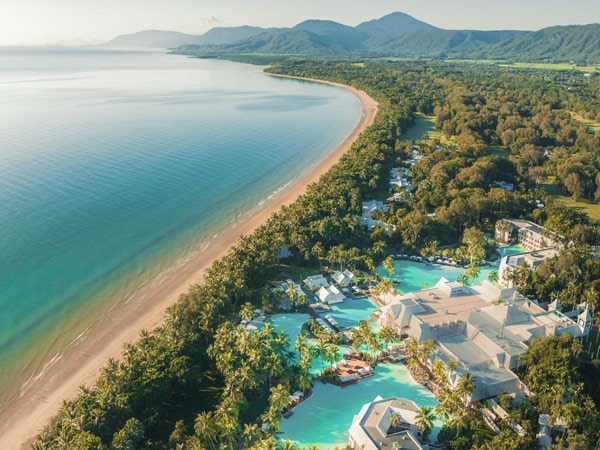 an aerial view of the beach next to Sheraton Grand Mirage Port Douglas