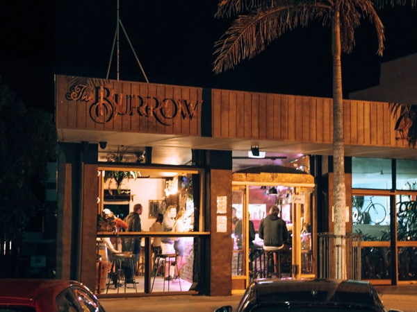 the restaurant exterior of The Burrow, Bogangar at night