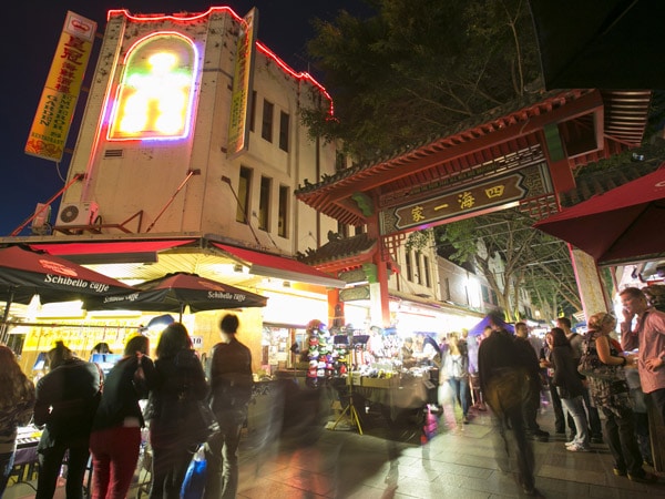 people shopping at night markets in Dixon Arcade Chinatown, Sydney