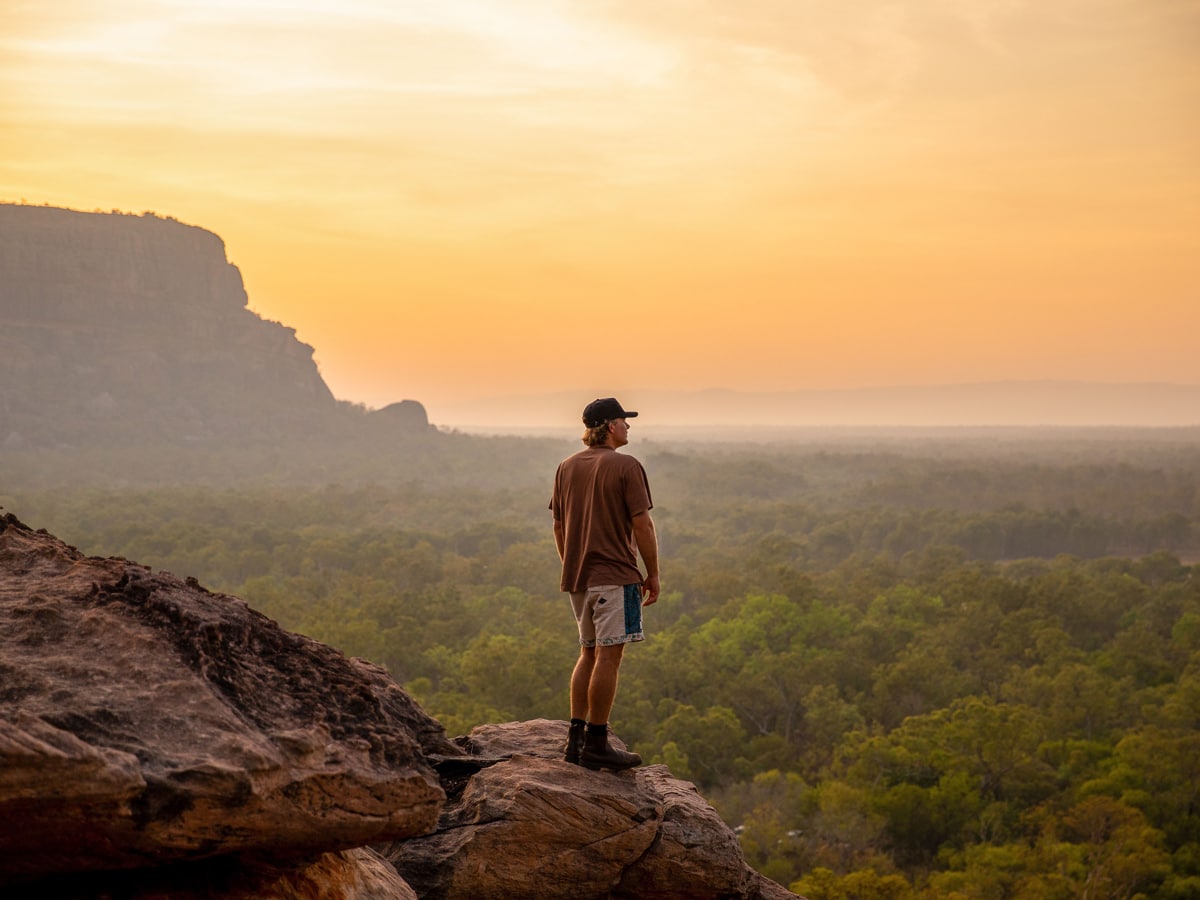 a man standing on top of Nawurlandja Lookout