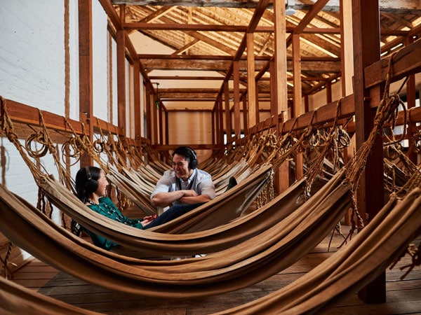 two people inside Hyde Park Barracks Museum