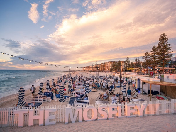 people chilling on beach chairs at The Moseley Beach Club, Glenelg Beach