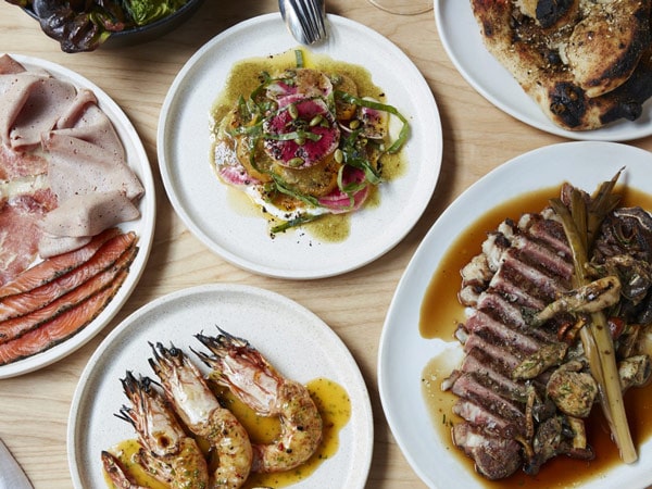 a table-top view of food at NOMAD Sydney