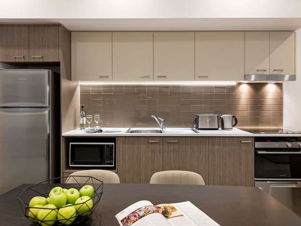 the kitchen inside the one-bedroom accommodation at Quest Newcastle West