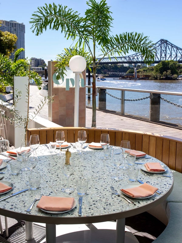 an al fresco dining setup at Opa Restaurant