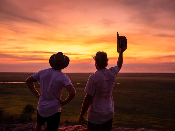 two people admiring the sunset from Ubirr, Kakadu