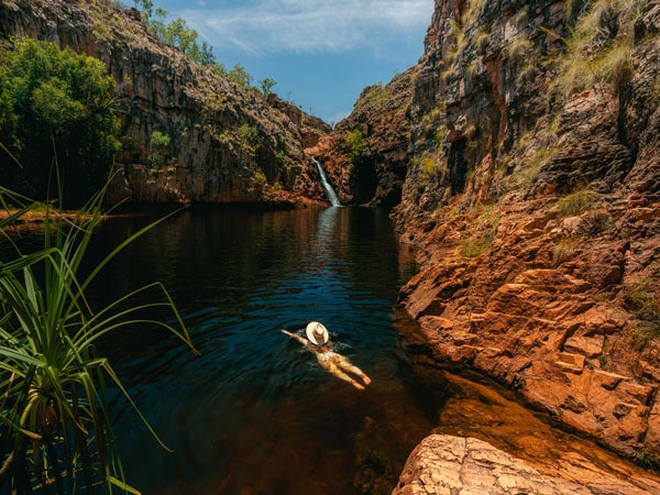 a woman swimming in Maguk